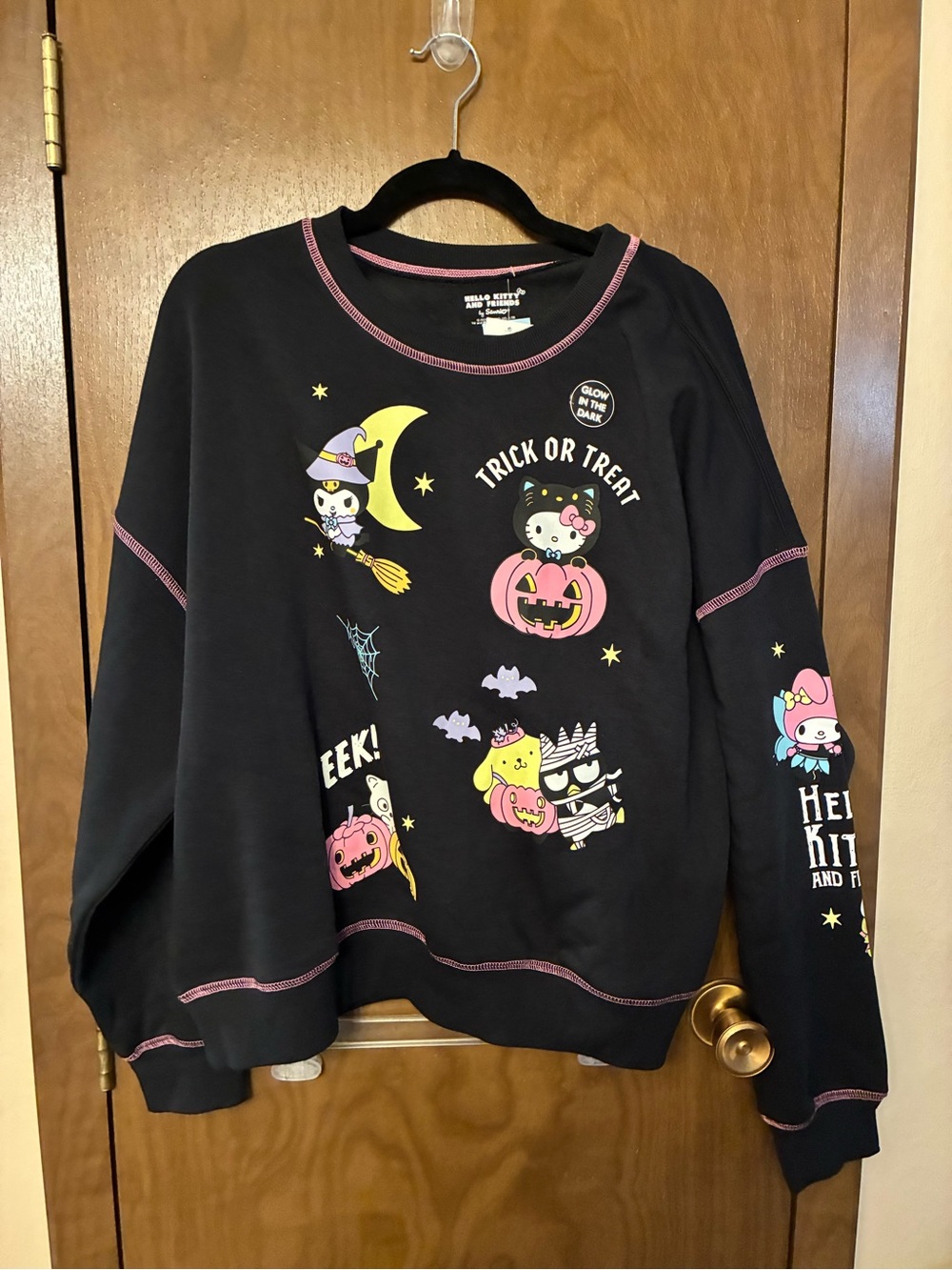 Hello Kitty Black Halloween Graphic Sweatshirt with Pink Trim